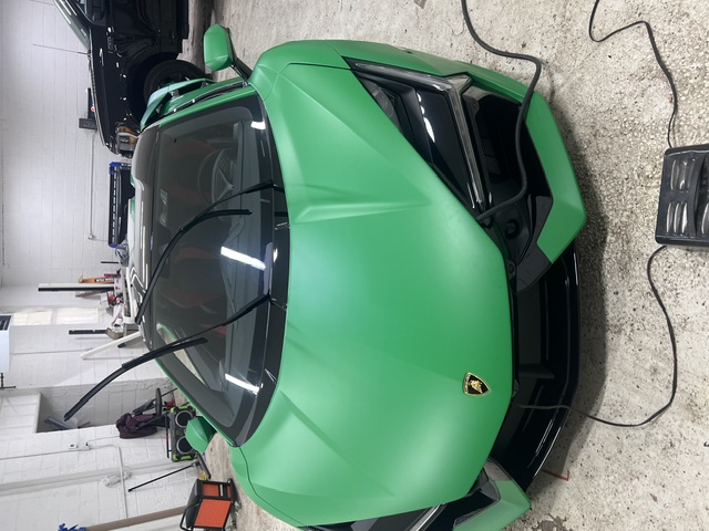 Supercar wrapped in mint green