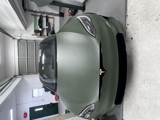Tesla wrapped in matte military green