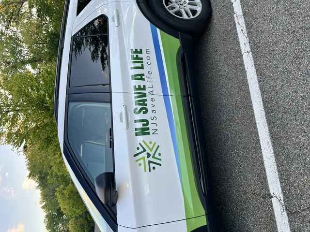 Commercial fleet van with printed graphics