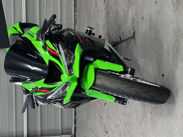 Motorcycle wrapped in high-visibility green